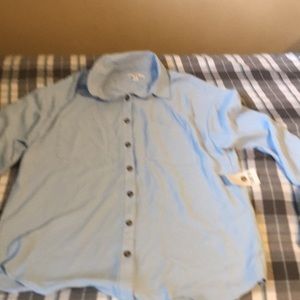 Blouse with buttoned cuffs and brand new not worn.